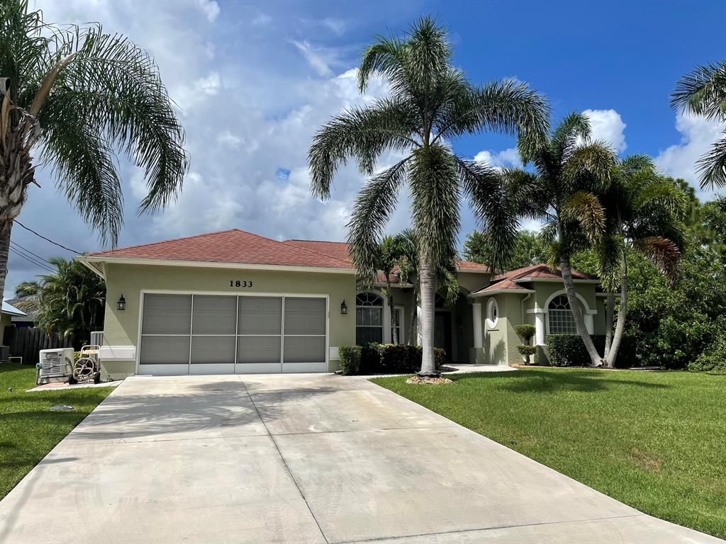 Photo of 1833 SW Millikin Avenue, Port Saint Lucie, FL 34953 (MLS # R10737205)