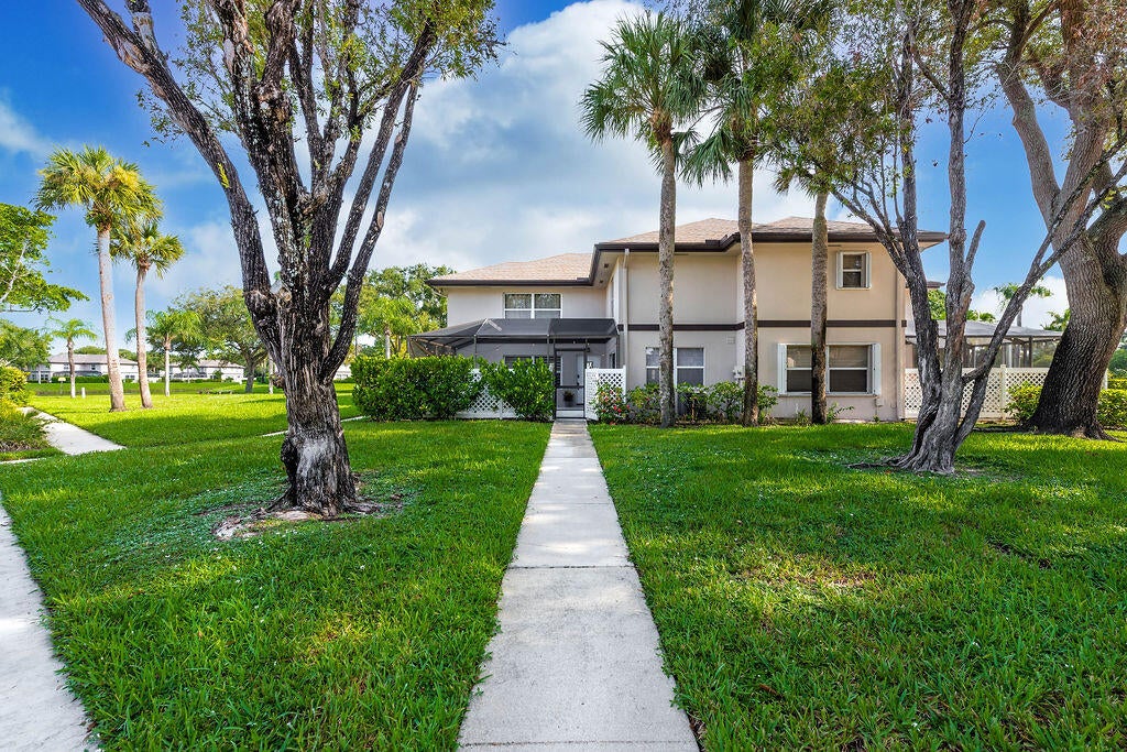 Photo of 38 Essex Court #D, Royal Palm Beach, FL 33411 (MLS # B26069917)
