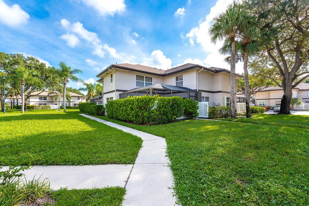Photo of 38 Essex Court #D, Royal Palm Beach, FL 33411 (MLS # B26069917)