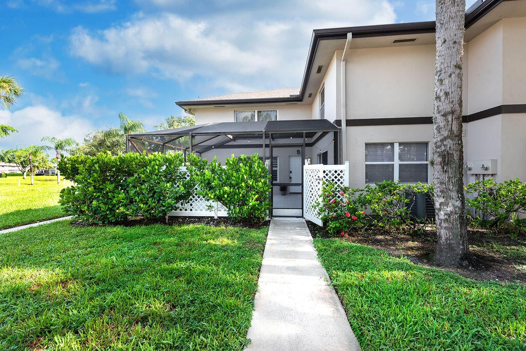 Photo of 38 Essex Court #D, Royal Palm Beach, FL 33411 (MLS # B26069917)