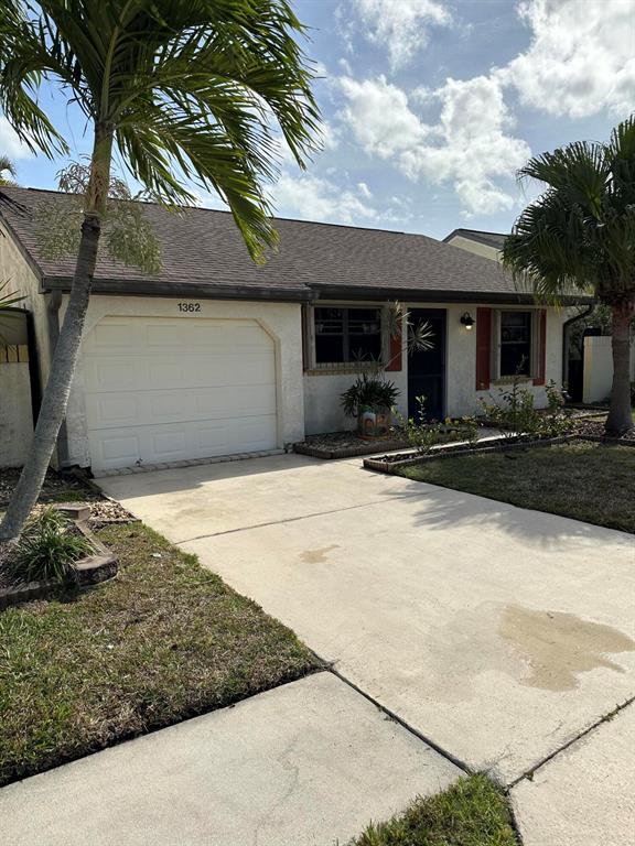 MOVE IN READY! Your Tropical Oasis awaits in this adorably bright and cheerful, 2 bed/1 bath home situated on a quiet cul-de-sac in Walton Court. Perfect for a Vacation, Starter or Downsize home, newer A/C (2018), nice jacuzie and effortless Accordion Shutters, crown moulding/architectural trim, and exterior utility cabinets. Enjoy an abundance of peaceful, outdoor living space on the screen-enclosed patio and large atrium or open air brick-paved lanai; all surrounded by mature palms, bird of paradise and bromeliads. Just minutes away from Beaches, US1 and Crosstown Parkway, Walton Court is a small, well-managed community treasured by its residents , priced to sell