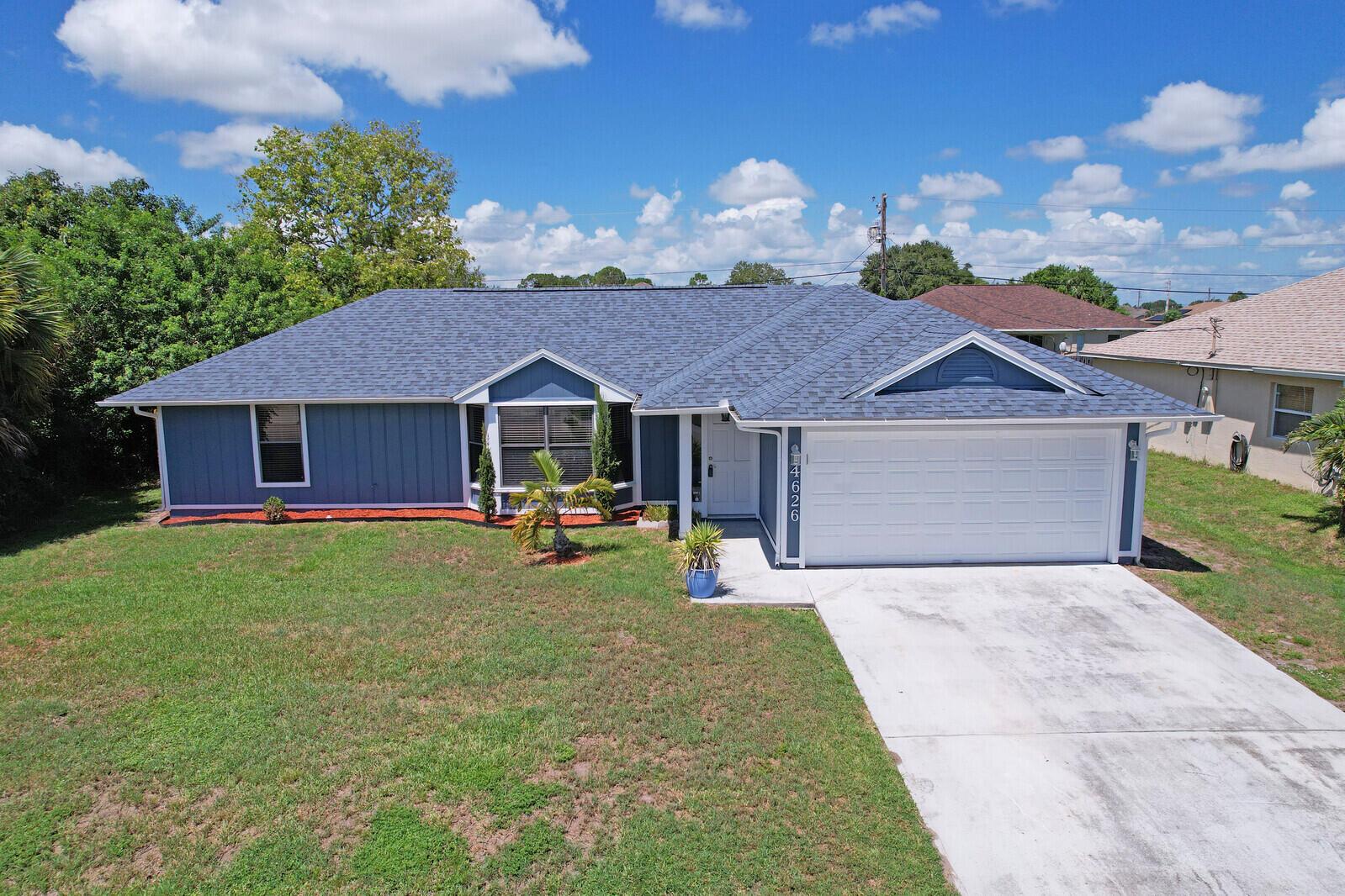 BRAND NEW ROOF!! FRESHLY PAINTED!! CLOSE TO BECKER RD. I-95 AND TURNPIKE! This gorgeous updated 3/2/2 has no HOA and ready to move in! Porcelain wood-look tile throughout and carpet in second and third bedroom. Updated and remodeled baths, huge yard!! Kitchen with all stainless appliances, new Bosch dishwasher and Frigidaire microwave! Pass through window to expansive screened porch length of back of home. .New hot water tank and 2019 A/C! New garage door opener and springs!