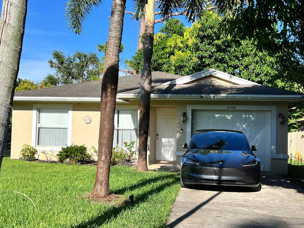 Photo of 4454 Urquhart Street, Lake Worth, FL 33461 (MLS # R11005858)