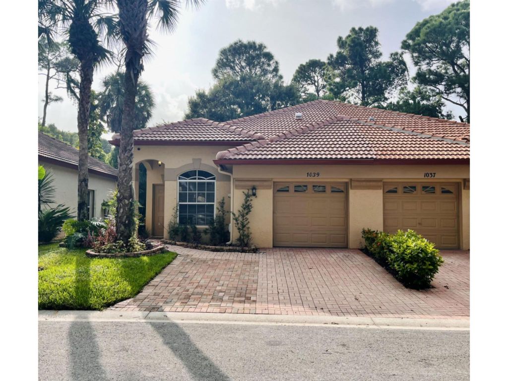 Photo of 1039 Via Jardin, Riviera Beach, FL 33418 (MLS # R10926886)