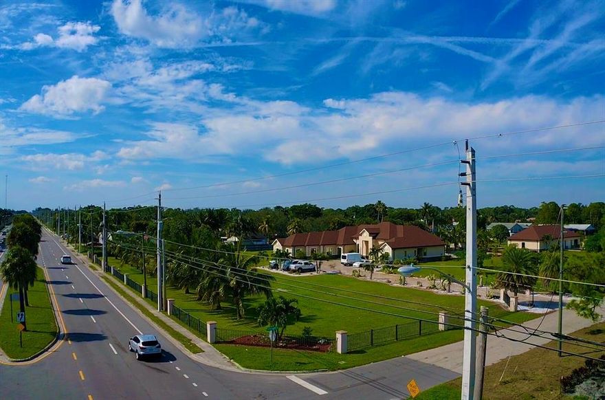 IMPACT WINDOWS AND DOORS ***. CORNER LANTANA ROAD  & COLBRIGHT ROAD ***. CUSTOM BUILT HOME DONE - OWNER CONTRACTOR - ***. EXTRA ATTENTION TO  DETAILS WITH HIGH END PROFESSIONAL CRAFTSMANSHIP **  2.96 ACRES ***. NO HOA***. CAR COLLECTORS  ***. BUSINESS OWNERS ***. DREAM HOME FOR ANY FAMILY*** 9525 TOTAL SQ FT ***. 6 BEDROOM 7 FULL BATHROOM, PLUS 2400 SQ FT DETACHED WORKSHOP PLUS HUGE PAVER LANAI AREA WITH SALT WATER POOL **** GREAT FRONTAGE EXPOSURE ON LANTANA ROAD *** NO HOA - BRING THE RV, BOAT, TRAILER AND TOYS.  WELL MAINTAINED **. CORNER LOT **. ONE OF THE BIGGER LOTS IN TOWN. ***.  ENDLESS POSSIBILITIES ***.  2016 BUILT ** CBS **.  6818 LIVING SQ FT  *** FULLY FENCED  **EXOTIC TROPICAL FRUIT TREES- 4 VARIETY OF MANGOES, LONGHAN, LYCHEE, STAR FRUIT, SOUR SOP, SUGAR APPLES, ROSE APPLE, COCONUT TREES WITH FRUITS ALL YEAR ROUND - SUPER SWEET MALASIAN DWAFT--- TOO MUCH TO LIST !!!!3 GAS TANKLESS WATER HEATER- WITH 200 GALLON UNDERGROUND TANK- LAST ALL YEAR** CITY WATER WITH MAINTENAMCE FREE FILTER AND CONDITIONER SYSTEM- - 1M GALLONS CAPACITY THAT WILL LAST APPROX 10 YEAR AND  LESS THAN 1 MONTH OLD !!!SEPTIC SYSTEM-WATER BILL  $ 28. PER MONTH.*****ELECTRIC BILL AVERAGES $185. MONTHLY- WITH 5 AC SYSTEM RUNNING 74 DEGREES- BECAUSE OF DENSE FOAM INSULATION IN ROOF AND WALLS****. VARIABLE SPEED POOL PUMP8****. 2 IRRIGATION WELLS *****HIGH EFFICIENCY MINI SPLIT ON 2ND FLOOR UNIT****.