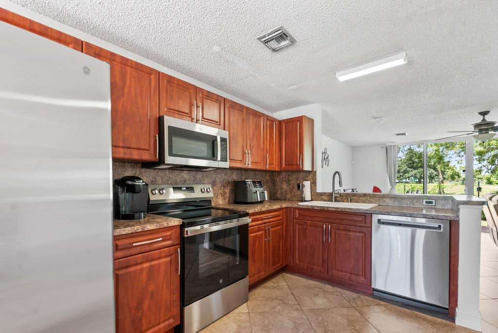 Photo of 7127 WOODMONT Way #7127, Tamarac, FL 33321 (MLS # B26068506)