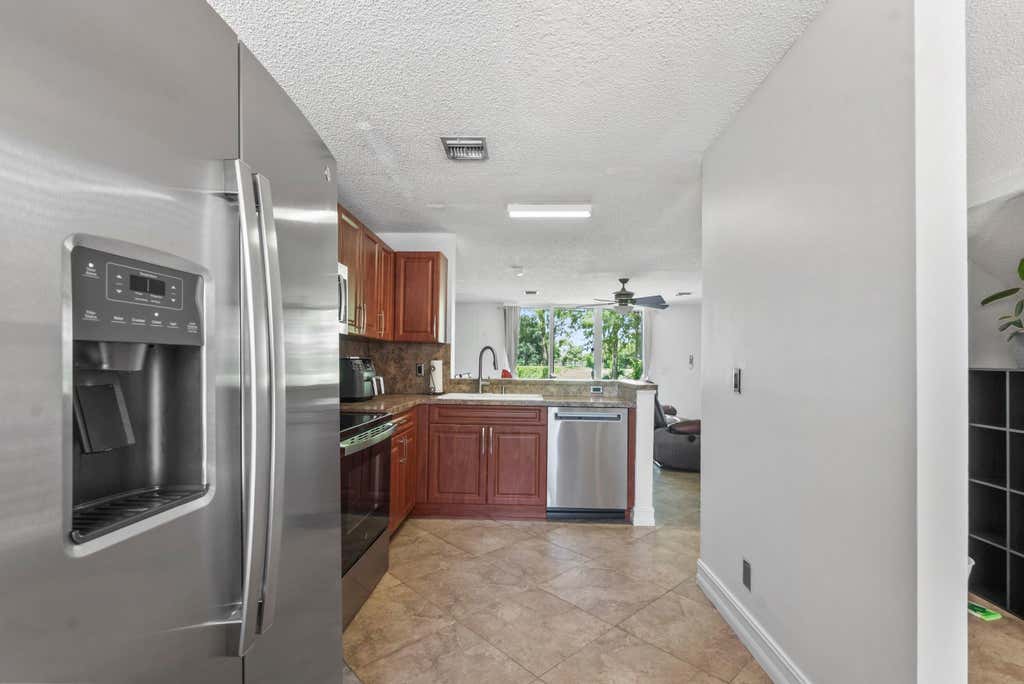 Photo of 7127 WOODMONT Way #7127, Tamarac, FL 33321 (MLS # B26068506)