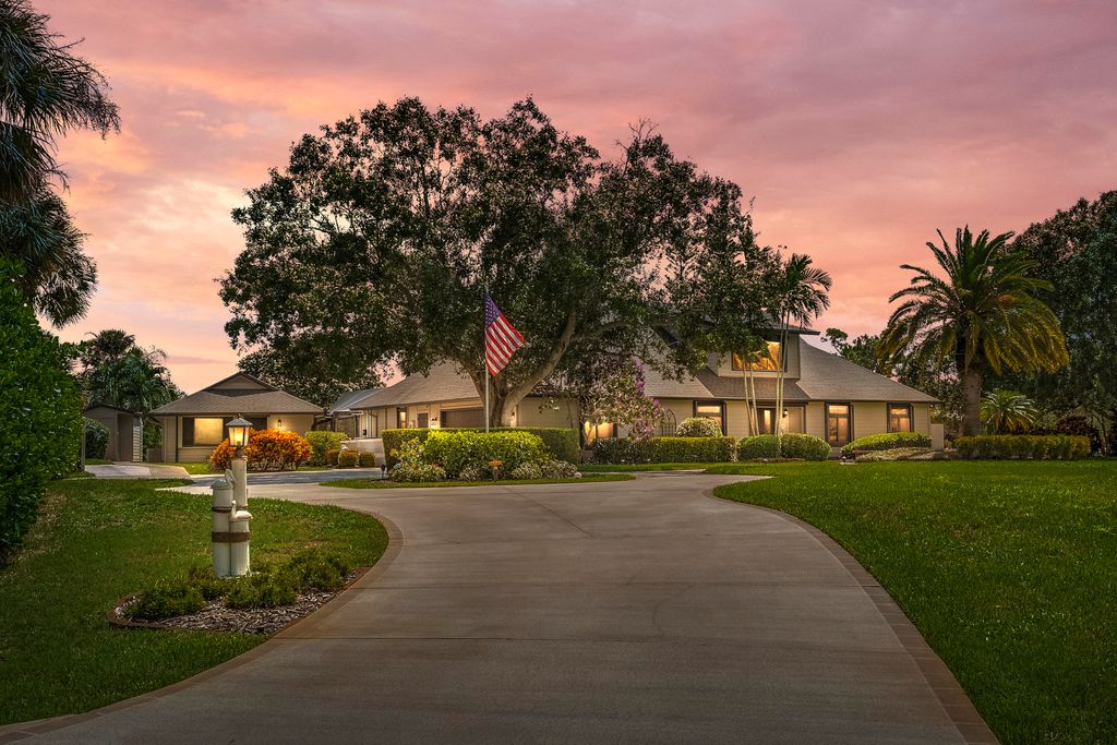 Photo of 304 NE Elm Terrace, Jensen Beach, FL 34957 (MLS # R11123220)