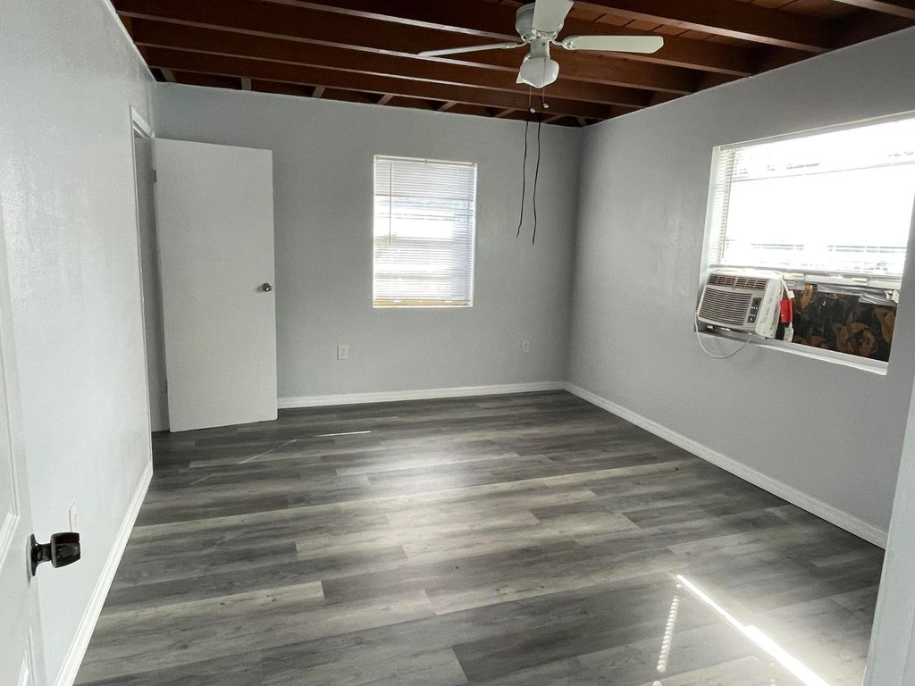 Photo of 107 E 27th Street, Riviera Beach, FL 33404 (MLS # B26032468)