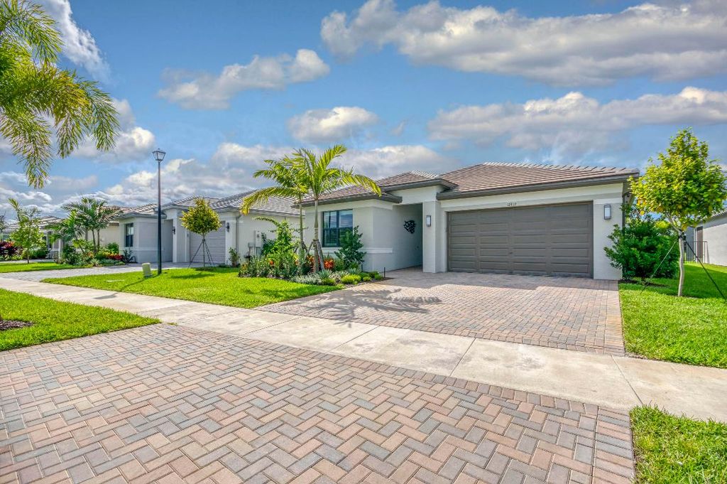Photo of 12312 SW Blue Mangrove Parkway, Port Saint Lucie, FL 34987 (MLS # R11148455)