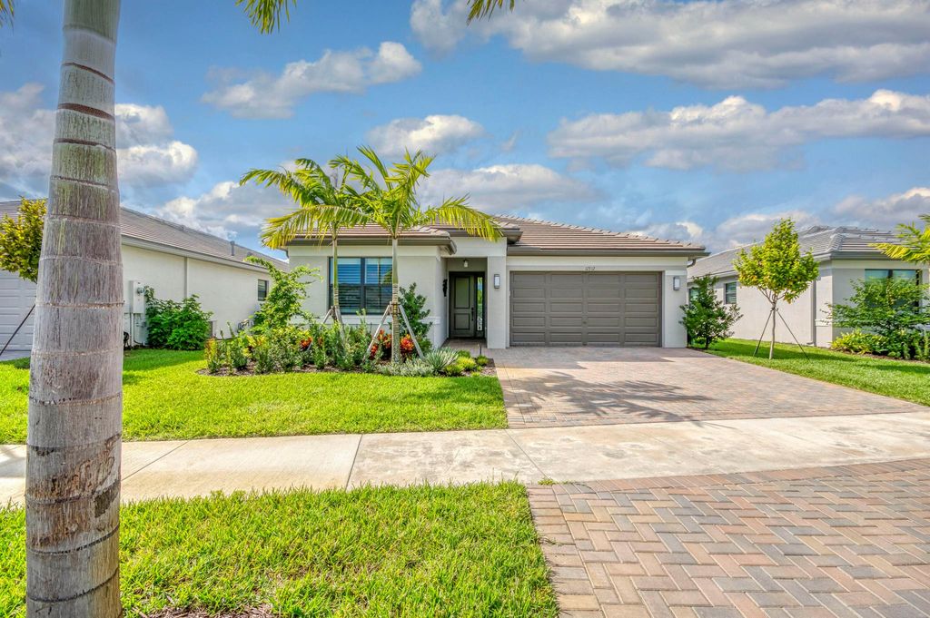 Photo of 12312 SW Blue Mangrove Parkway, Port Saint Lucie, FL 34987 (MLS # R11148455)
