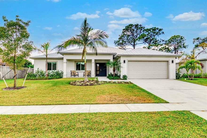 BRAND NEW! No HOA, Impact glass, HUGE backyard, close to A rated schools... this one has it all! Come see this spacious new home with vaulted ceilings, standing seam metal roof, secondary roof cover for insurance discounts, isonene insulation for energy efficiency, attic storage, stainless steel appliances, quartz countertops, porcelain ceramic tile floors through-out, upgraded water system electric car charger in garage, large covered patio, huge private backyard,185' deep lot.