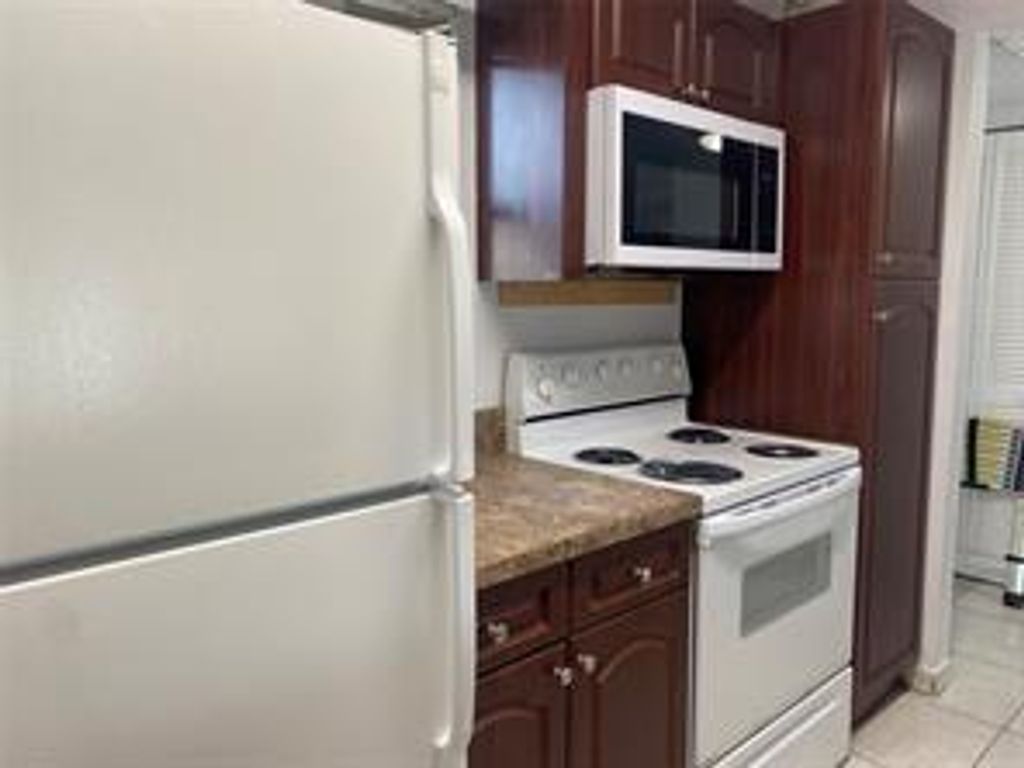 Photo of 10137 Twin lakes Drive #10137, Coral Springs, FL 33067 (MLS # F10514566)