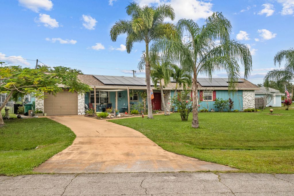 Photo of 2574 SE Marseille Street, Port Saint Lucie, FL 34952 (MLS # R10941350)