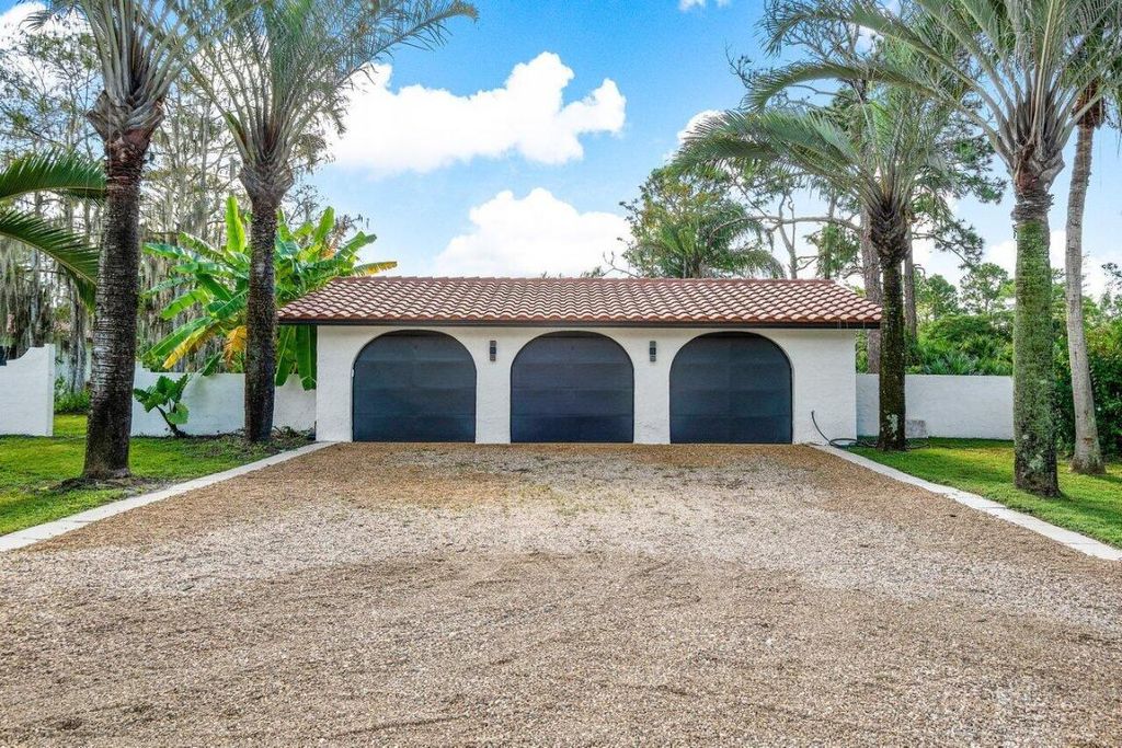 Photo of 13619 Deer Creek Drive, Palm Beach Gardens, FL 33418 (MLS # R11156855)