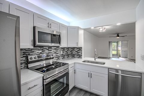 Photo of 7094 Golf Colony Court #102, Lake Worth, FL 33467 (MLS # R11153458)