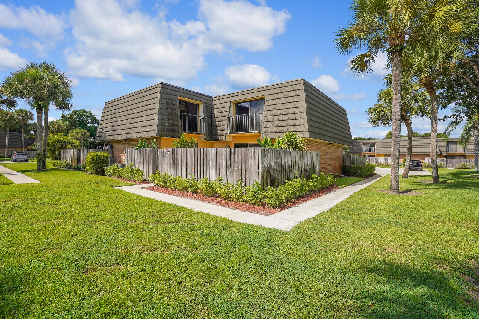 Functional 2 bed, 2 bath townhome with 1,236 sq ft in the desirable Village of Sandalwood Lakes centrally located in West Palm Beach. Enjoy peaceful pond views from the large fenced patio or second floor balcony perfect for outdoor living. Community amenities include pool, tennis, basketball, playgrounds, scenic lakes, and more. Located in a prime West Palm Beach location, this townhouse is just minutes from local amenities, including major ballparks, Palm Beach International Airport, schools, shopping, I-95 and other major highways. Whether you're looking for a place to call home or an investment opportunity, this townhouse offers the best of both worlds. This home is ready for your personal touch. Call and schedule your showing today.