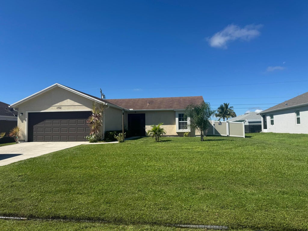 Photo of 1752 SW Bonanza Street, Port Saint Lucie, FL 34953 (MLS # R11131875)