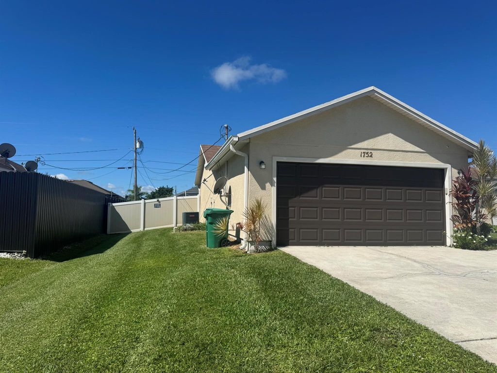 Photo of 1752 SW Bonanza Street, Port Saint Lucie, FL 34953 (MLS # R11131875)