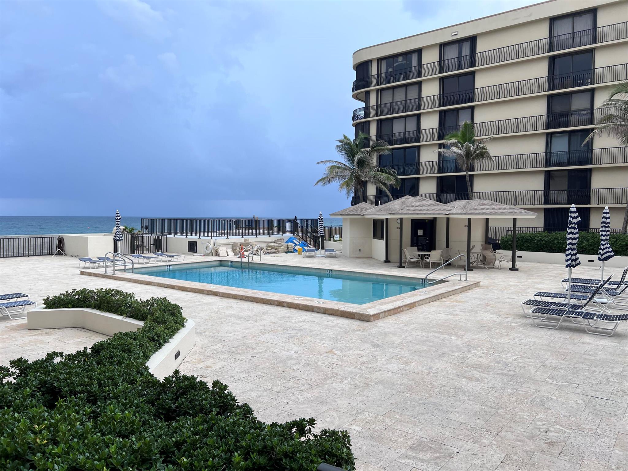 Walk directly out the patio to the large renovated pool area then steps to the sandy beach & ocean. Condo has been recently renovated with new marble floors, open large kitchen & dining room, and bathrooms. Rental is offered fully furnished turn-key