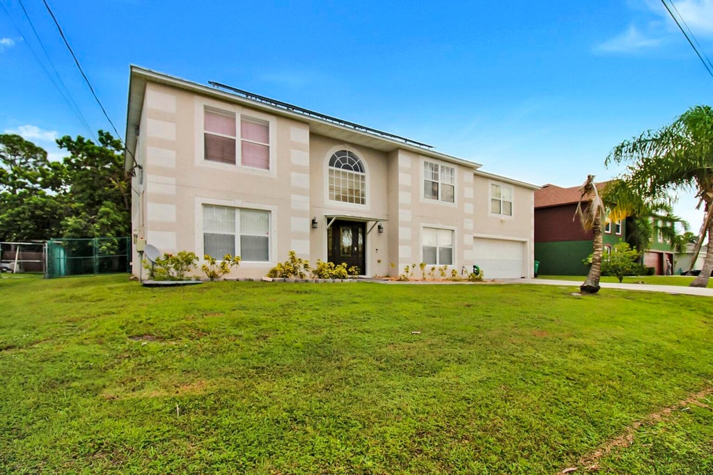 Photo of 3917 SW BAMBERG Street, Port Saint Lucie, FL 34953 (MLS # B26070320)