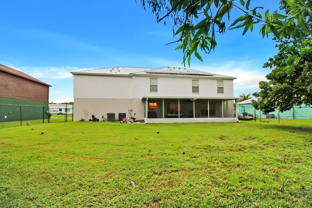 Photo of 3917 SW BAMBERG Street, Port Saint Lucie, FL 34953 (MLS # B26070320)