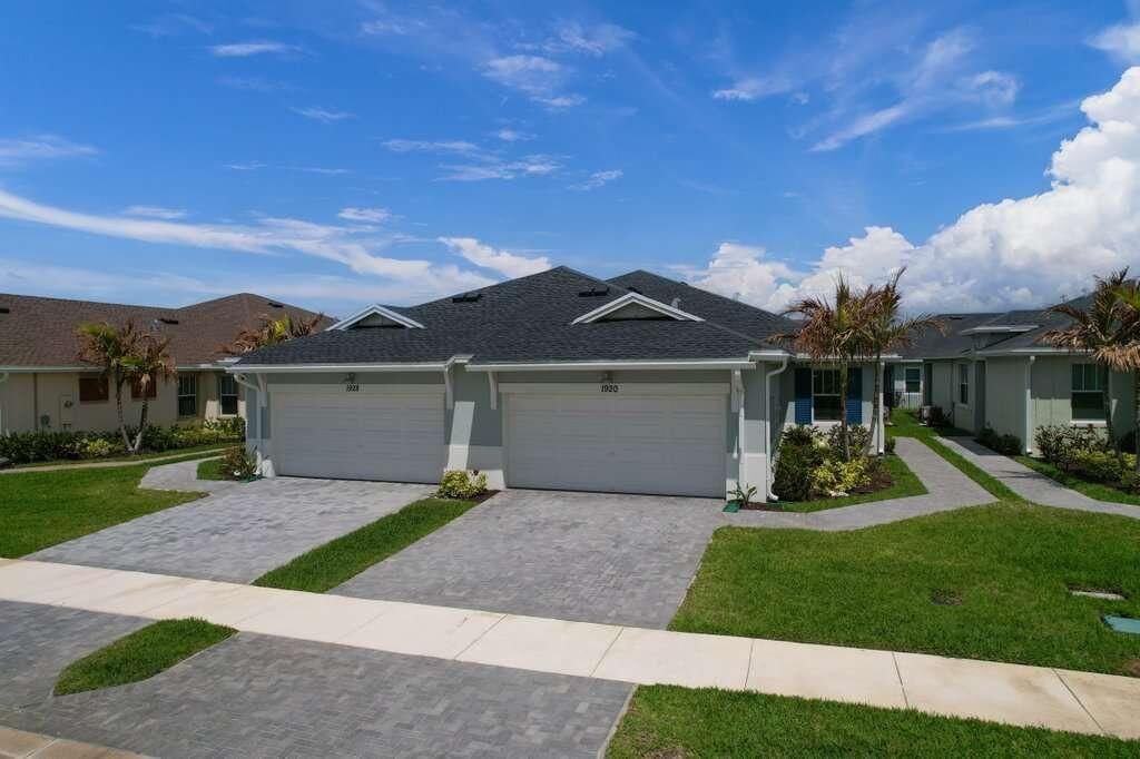 Photo of 1920 SE Crosswood Way, Port Saint Lucie, FL 34984 (MLS # B26012027)