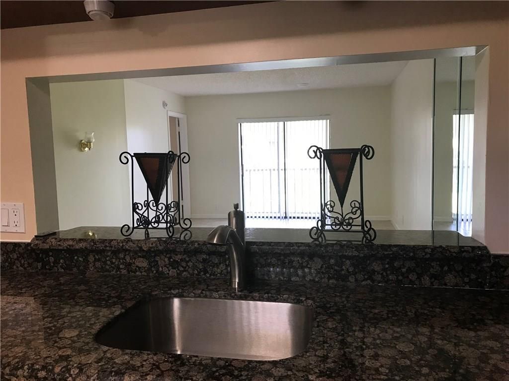 Photo of 6808 S Palmetto Circle #201, Boca Raton, FL 33433 (MLS # F10439424)