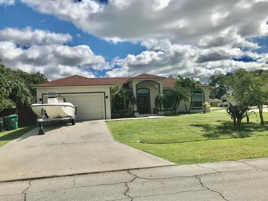 BEAUTIFULL 4/2/2 HOME LOCATED ON A QUIET STREET SURROUNDED OF NEWER HOMES ,  SITTING ON LARGE  CORNER  LOT  0.27 ACRES.    WITH STAINLESS APPLIANCES ON KITCHEN,EAT IN KITCHEN  ,BREAKFAST KNOCK , TWO WALK IN CLOSETS IN MASTER,  TILE ALL THROUGH AND LAMINATE FLOORS , BIG BACKYARD TO RELAX AND LOOK AT THE SUNSET AND READY FOR YOUR DESIRED POOL.