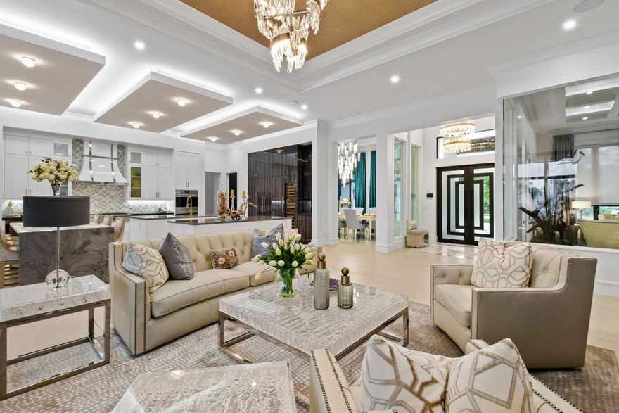 Introducing the epitome of luxury living inside The Medalist Village! This custom built *FURNISHED home is nestled amidst stunning views of the golf course and preserve, this beautiful abode offers an unparalleled living experience. Boasting 4 spacious bedrooms and 6 exquisite bathrooms, this home is the embodiment of comfort and style. Every room has been meticulously crafted and furnished to create a haven of tranquility, providing ample space for you and your loved ones to relax and unwind. Prepare to be amazed by the state-of-the-art features this technologically advanced home has to offer including a programmable Lutron lighting and electrical system State of the art alarm system and sound system. Electric Car ready garage, and a whole house generator and water purification system, you can bid farewell to any worries about power outages or impurities. Picture yourself cozying up by one of the two magnificent fireplaces, enveloped in the warmth and ambience they provide. Whether you're hosting a grand soirée or simply enjoying a quiet evening, these fireplaces will undoubtedly become the heart of your home.
Indulge your senses in the exquisite wet bar area, designed to cater to your entertainment needs. Sip on your favorite beverages and unwind in style as you entertain your guests, creating unforgettable memories in the process.
For those who require a workspace that inspires productivity, our office with a glass wall offers the perfect environment. Bask in natural light and enjoy panoramic views while you work, ensuring that your creativity and focus remain at their peak.
Step outside into your own private oasis. Take a refreshing dip in the pool, or immerse yourself in the soothing waters of the hot tub. The choice is yours. Unwind and relax in the privacy of your own backyard, surrounded by lush greenery and the stunning vistas of The Medalist Village Golf Course, with not another home in site. Discover the additional allure of a cassita, providing a separate living space for guests or even a personal retreat. The possibilities are endless with this versatile feature, offering utmost convenience and flexibility. Make this dream home yours and experience the ultimate in luxury living. Don't miss out on the opportunity to own this exquisite masterpiece in The Medalist Village which offers Golf, Tennis, Spa, Gym and Australian Pub, where every moment is filled with beauty and serenity. 
*FURNISHED MINUS PERSONAL ITEMS AND SOME ART