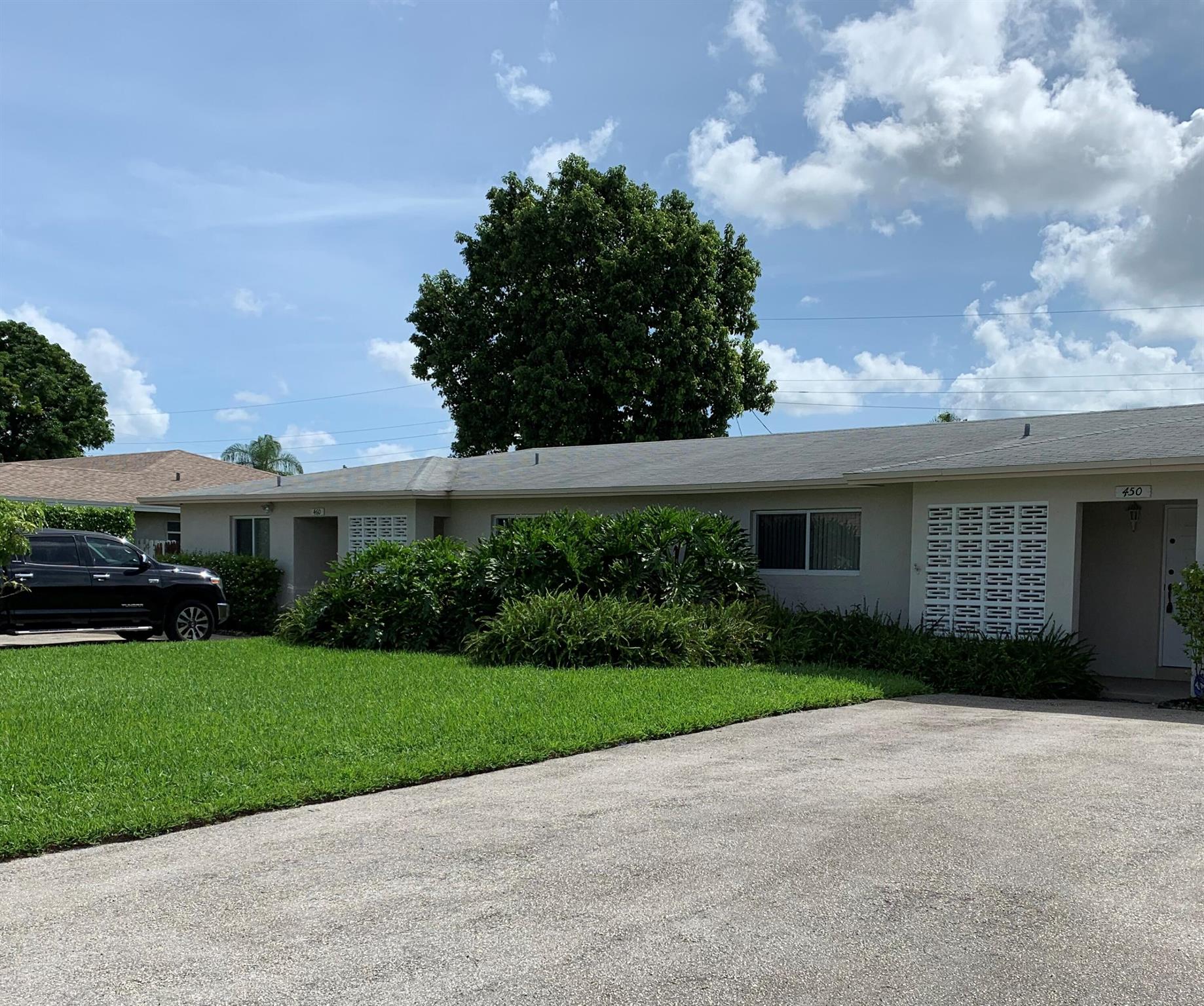 COMPLETELY REMODELED DUPLEX IN 2015, NEW TILE, CARPET, CEILINGS REFINISHED, DUCT WORK, A/C UNITS, KITCHEN, BATHROOMS, INTERIOR/EXTERIOR DOORS, BASEBOARDS, DOOR TRIM, OUTLETS, UPGRADED PVC SEWER SYSTEM, **IMPACT WINDOWS & DOORS** ALARM SYSTEM, CAMERAS, STAINLESS APPLIANCES, NEWER WASHER & DRYER. POOL REMODELED IN 2024, NEW ROCK BACK YARD 2024. AUTO SPRINKLERS, MAIN ROOF 2011. **NO HOA**