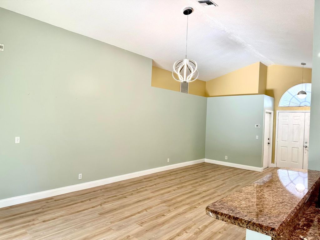 Photo of 420 Trotters Lane, Greenacres, FL 33413 (MLS # R11081161)