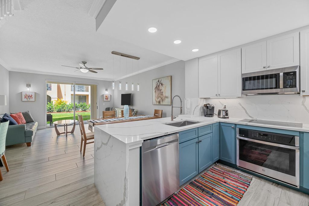 Photo of 11775 St Andrews Place #103, Wellington, FL 33414 (MLS # B26042242)