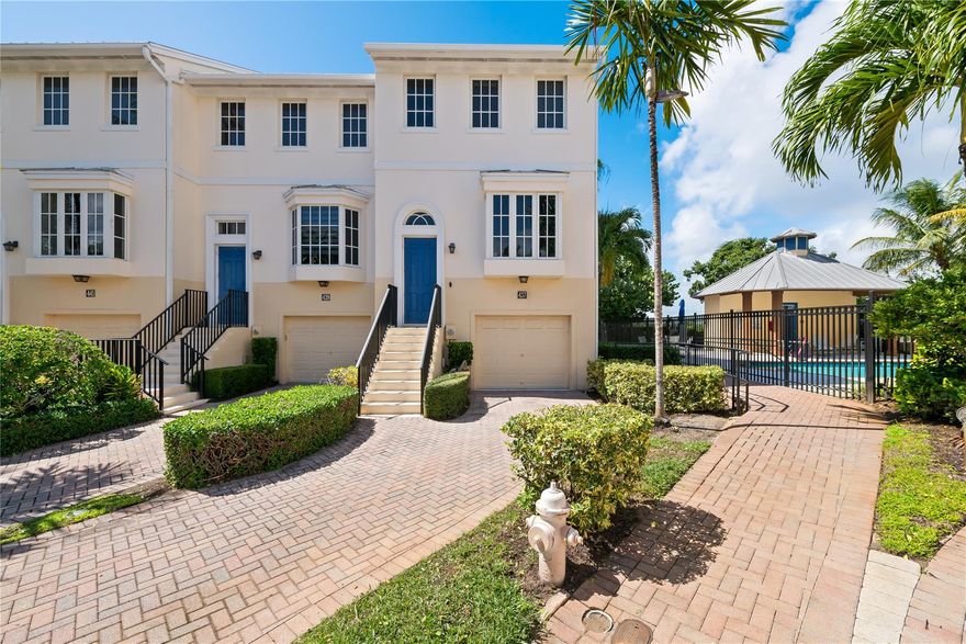 Just steps from the community pool and beautiful beach, this spacious fully furnished 2-bedroom, 2.5-bathroom townhome with a 1-car garage offers coastal living at its finest. Enjoy the convenience of two primary suites, one on the first floor and another on the third floor, ideal for privacy and flexibility. The home features numerous upgrades, including wood flooring throughout, hurricane impact windows. The kitchen boasts wood cabinetry, granite countertops, and stainless steel appliances, making it both stylish and functional. The upstairs primary suite has a newly renovated bathroom complete with a modern frameless glass shower and jacuzzi tub, creating a luxurious retreat. Don’t miss this opportunity to live just moments from the beach in a beautifully updated home!