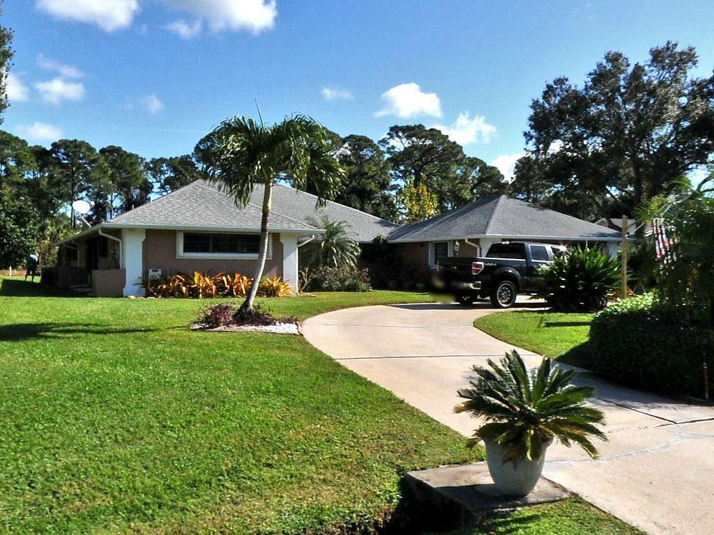 Photo of 2893 SE Italy Street St, Port St Lucie, FL 34952 (MLS # R10798859)