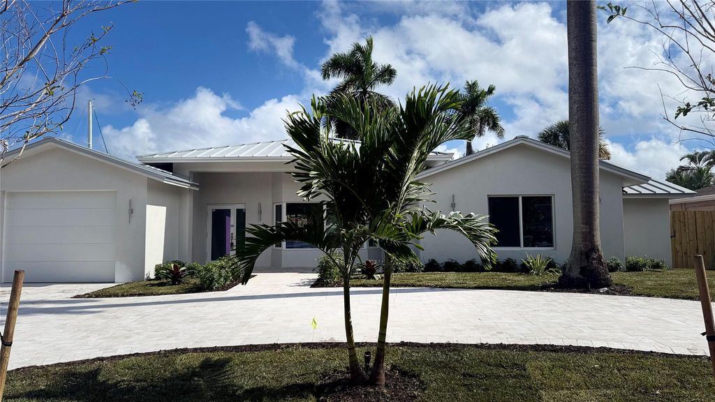 Photo of 1240 NE 27th Way, Pompano Beach, FL 33062 (MLS # F10540990)