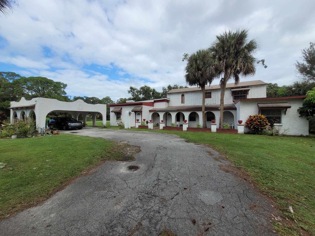 Photo of 8208 Lakeland Boulevard S, Fort Pierce, FL 34951 (MLS # R10931532)