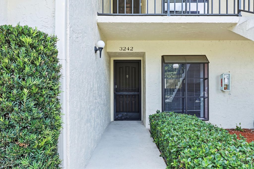 Photo of 3242 Perimeter Drive, Greenacres, FL 33467 (MLS # B26033066)