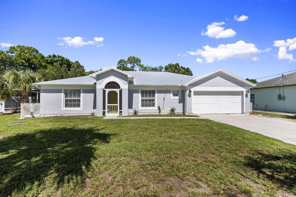 Photo of 5712 Tangelo Drive, Fort Pierce, FL 34982 (MLS # R11110022)
