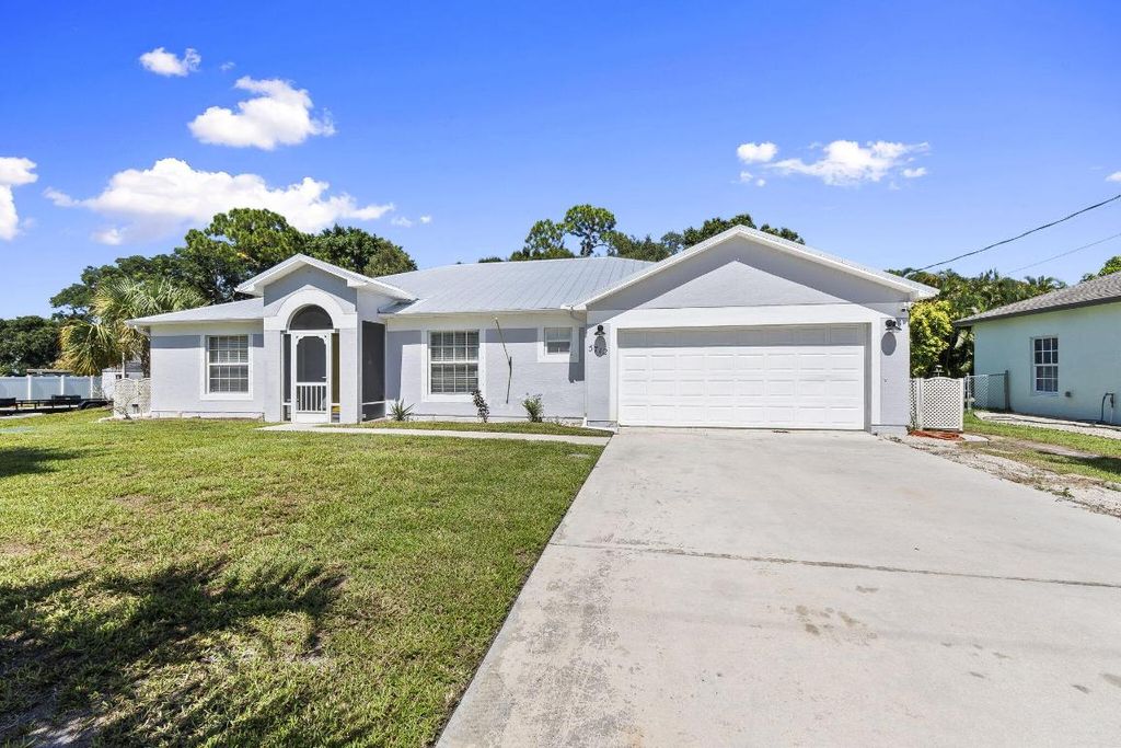 Photo of 5712 Tangelo Drive, Fort Pierce, FL 34982 (MLS # R11110022)