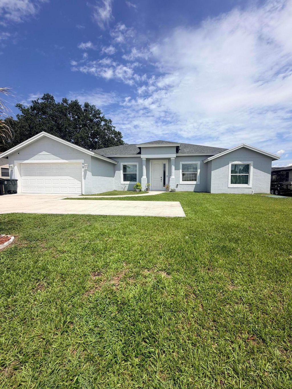 Photo of 981 SW California Boulevard, Port Saint Lucie, FL 34953 (MLS # B26029828)