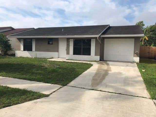 Photo of 5862 Triphammer Road, Greenacres, FL 33463 (MLS # B26031544)