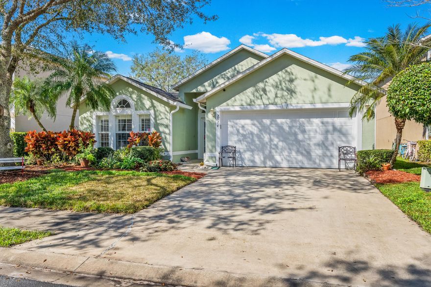 Lakefront living at its finest enjoy an affordable Florida lifestyle in the desirable Majestic Oaks neighborhood a true oak community that is protected by impressive mature Live Oak trees + sidewalks, pool, playground, security gates & lakes. New roof 2023, new wood looking LTV flooring 2025, A/C 2023 updated kitchen and baths, extra deep garage for trucks & beautifully groomed landscaping. A perfect location near shopping, dining, schools, parks and the new Intergenerational Community Center just off Oslo Road offering easy access to the new I-95 interchange West & South w/dock access to the Indian River Lagoon to the East