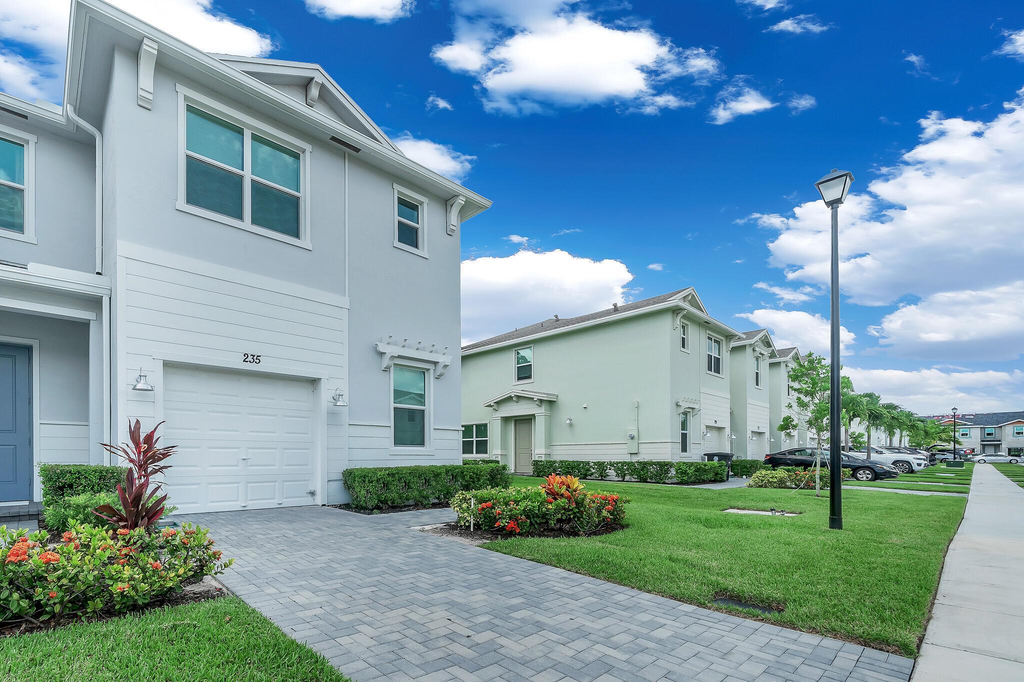 Welcome to 235 SE Woodbark St - a beautifully finished home in the brand-new Veranda Landing community! This 3-BR + Den, 2.5-bath property offers 1,821 sq ft of living space (2,105 total sq ft) with modern finishes throughout. Enjoy an open-concept layout featuring a spacious kitchen an island and quartz countertops, SS appliances, white shaker cabinets, and ample room for entertaining. 1-car garage with sleek epoxy flooring for a polished look. The community offers a pool, pet friendly. Minutes from the Turnpike, supermarkets, restaurants, shops, and a new hospital coming soon. Perfect for end-users and investors alike - currently tenant-occupied with income potential already in place. Don't miss the opportunity to own in one of Port St. Lucie's most convenient and fast-growing areas!