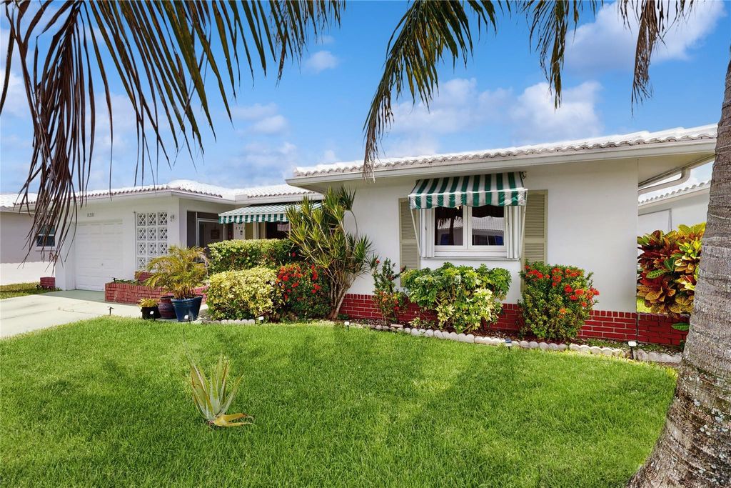 Photo of 8201 NW 59th Ct, Tamarac, FL 33321 (MLS # F10515567)