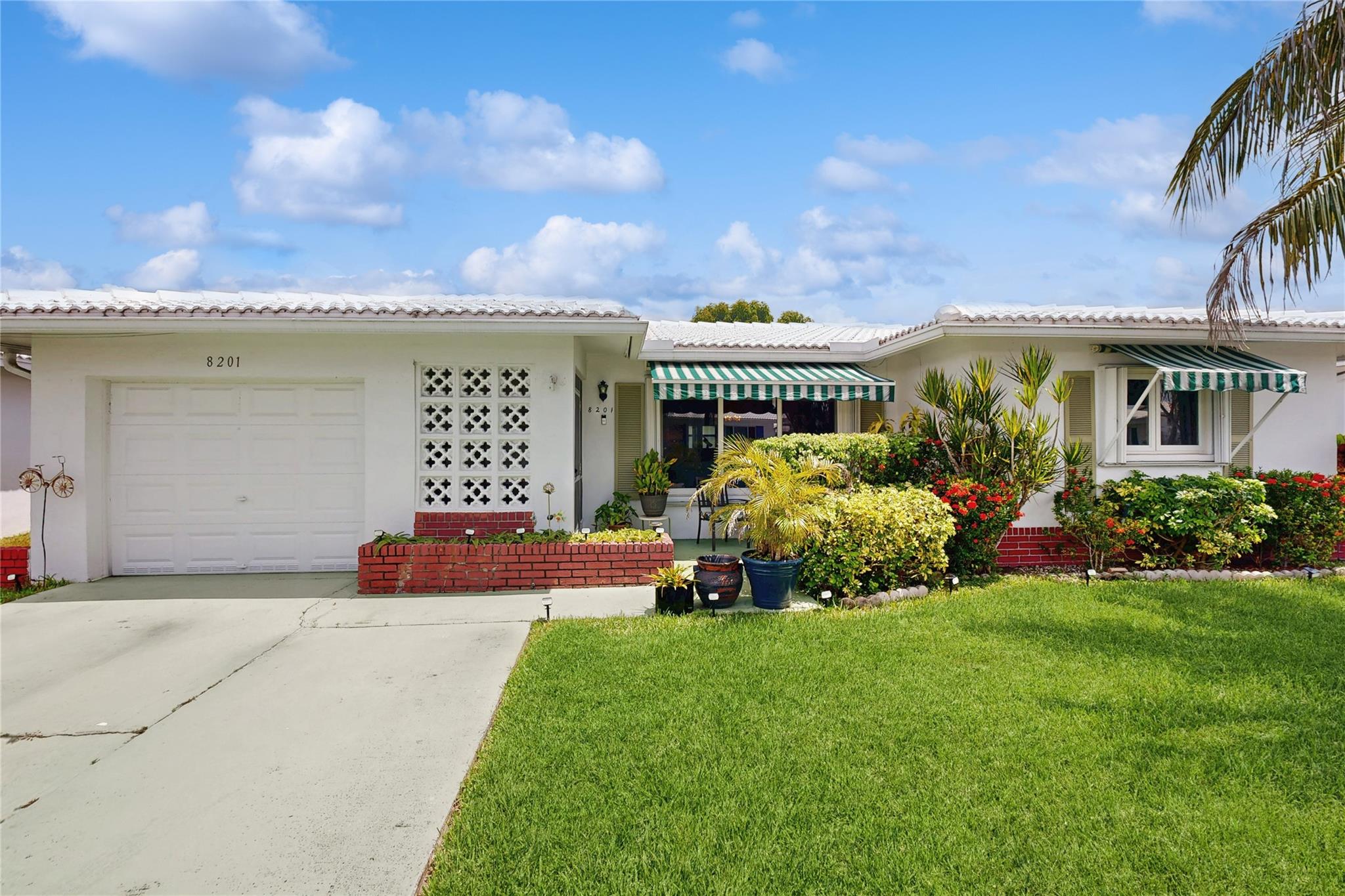 Welcome to Mainlands of Tamarac! Discover your dream home in the highly sought-after 55+ community! This charming and beautifully maintained 2 bedrooms, 2 bathroom home offers plenty of space with bonus den/office perfect for relaxing and entertaining. This large spacious home has a open plan living/dining, beautiful eat-in kitchen with Quartz countertops. Take advantage of the fantastic clubhouse, pool and all the community amenities. Low monthly maintenance includes Lawn care and Irrigation. Close to shops, gyms, restaurants and more. Don't miss your chance to own this move-in-ready home in a desirable neighborhood!