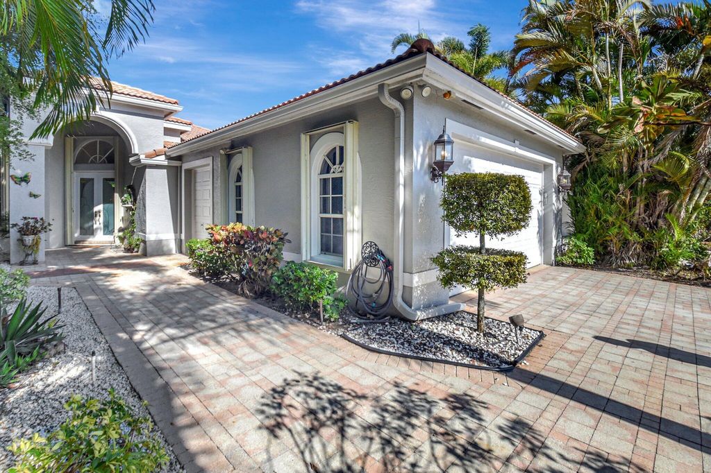 Photo of 4022 Manchester Lake Drive, Lake Worth, FL 33449 (MLS # R11160197)