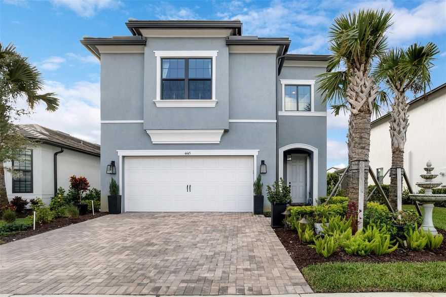 Enjoy resort-style living in Oak Tree, a premier gated community. Built in 2023, this 3-bedroom, 2.5-bath home includes a two-car garage and modern finishes. The kitchen features quartz counters, wall oven, gas range, and an island that opens to the living area. A dining room with backyard views connects to the screened patio. The first floor offers a flex office with French doors, while upstairs a den separates the bedrooms.The primary suite boasts a tray ceiling, walk-in closet, and spa-style bath with oversized shower. Built to current codes with impact glass, high ceilings, new roof, and appliances under warranty. Community amenities include a clubhouse, pickleball courts, barefoot bar, resort-style pool with cabanas, BBQs, fire pits, fitness center, dog park, and more.