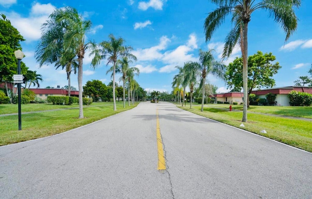 Photo of 351 Covered Bridge Boulevard #B, Lake Worth, FL 33467 (MLS # B26058772)