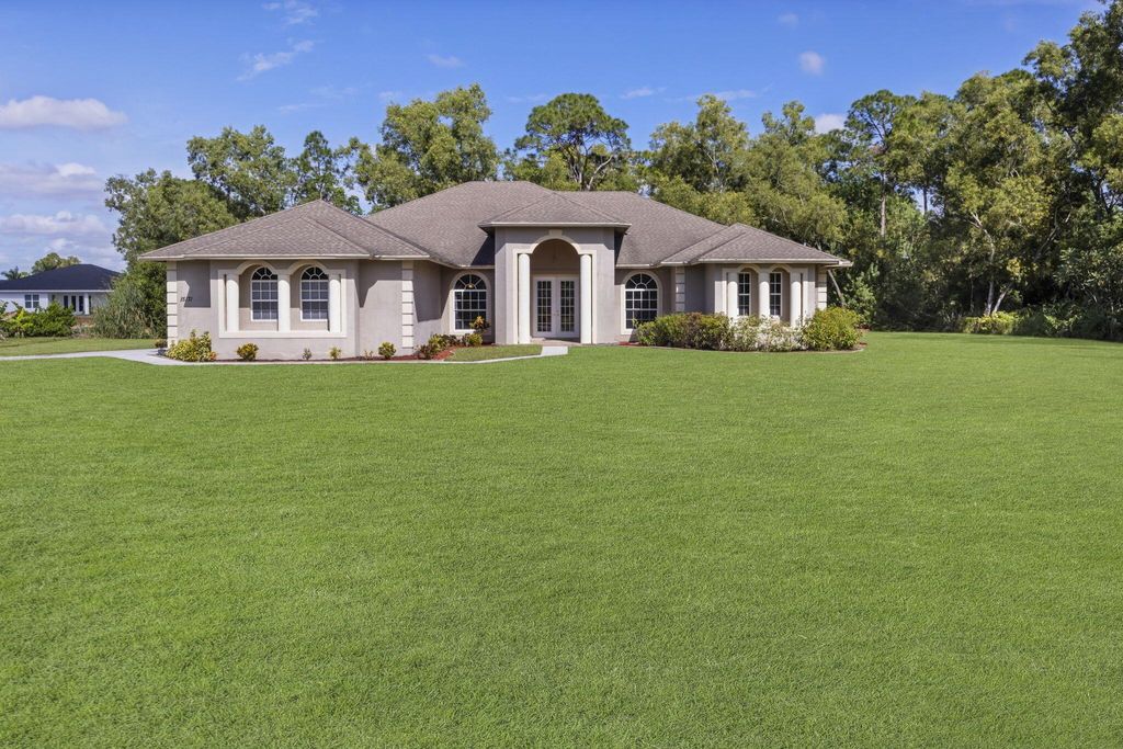 Photo of 15171 Hamlin Boulevard, Loxahatchee, FL 33470 (MLS # R10934491)